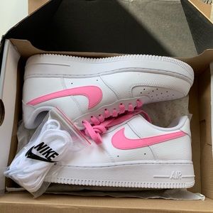 nike shoes with pink swoosh